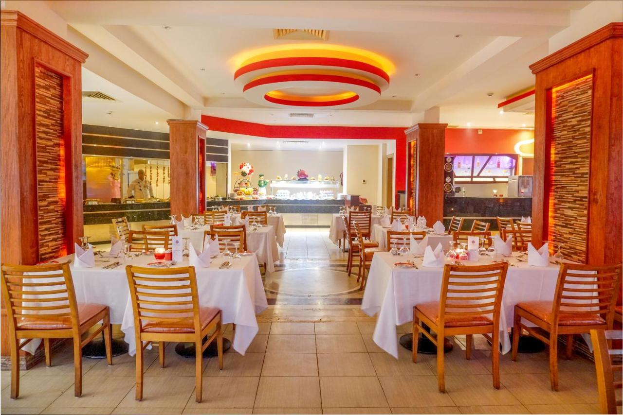 Charmillion Club Aquapark 호텔 샤름 엘 셰이크 외부 사진 The interior of the restaurant
