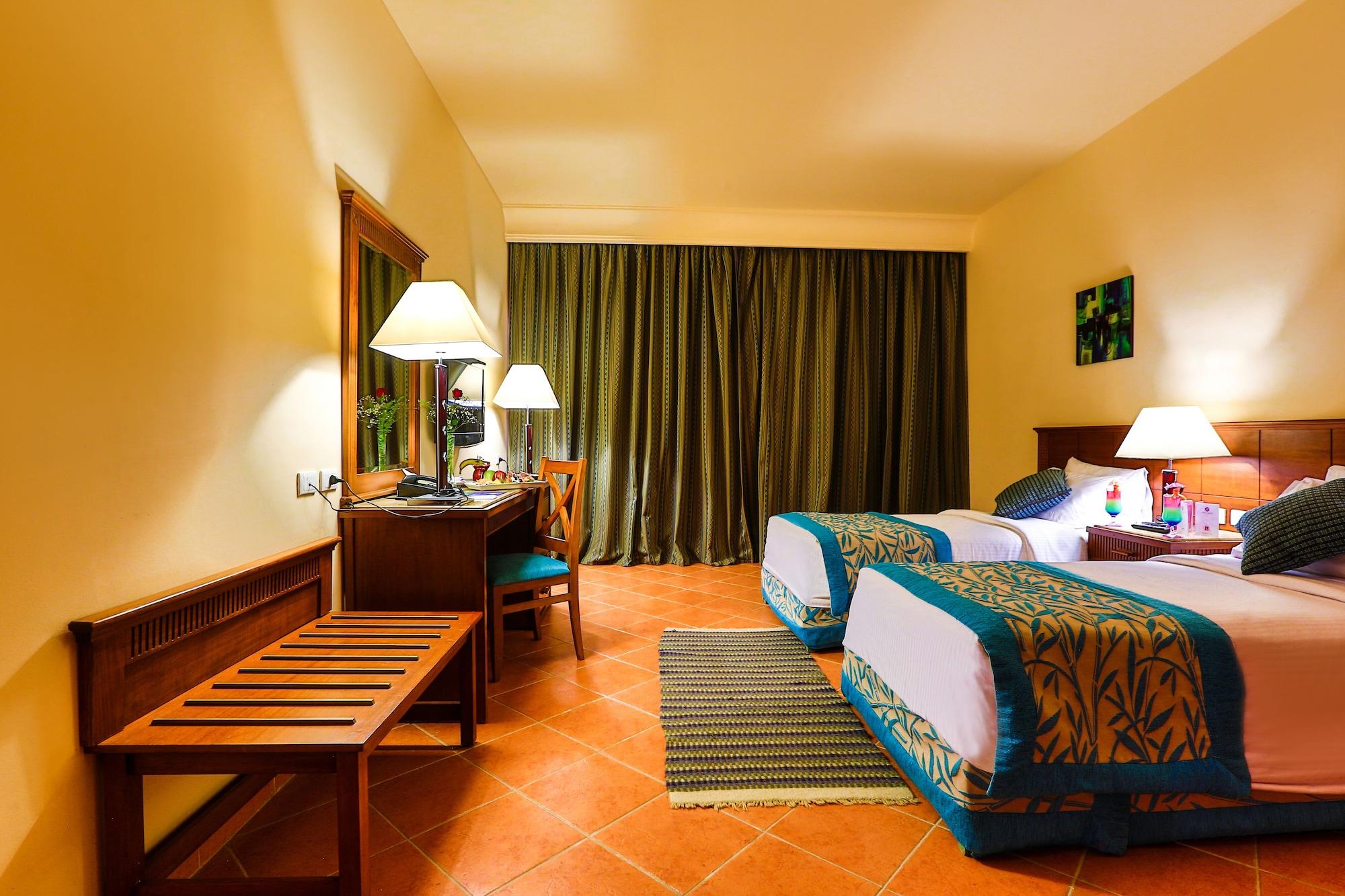 Charmillion Club Aquapark 호텔 샤름 엘 셰이크 외부 사진 A room at the hotel
