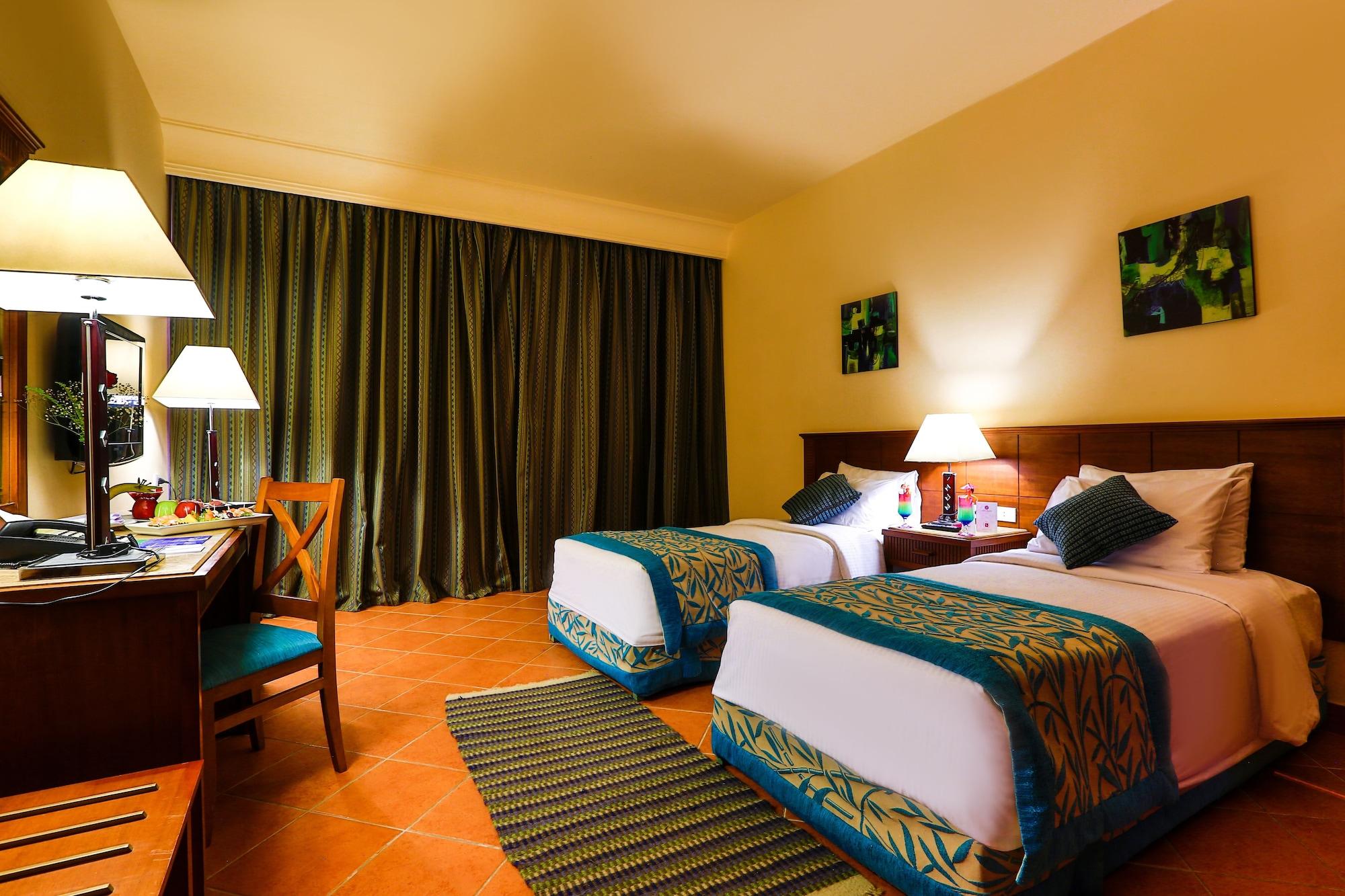Charmillion Club Aquapark 호텔 샤름 엘 셰이크 외부 사진 A room at the hotel